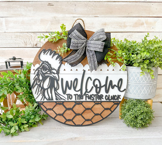Welcome to the Fuster Cluck 18" Round Door Hanger – Hand-Painted Laser Cut Funny Farmhouse Sign