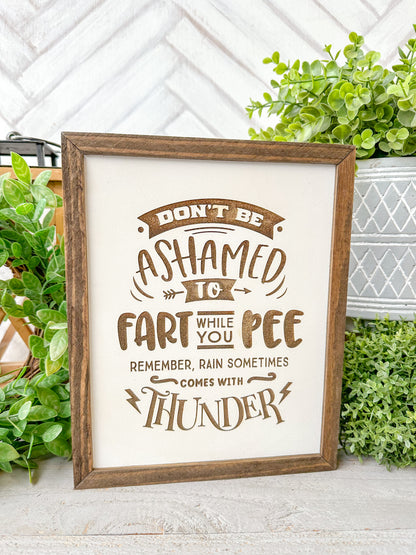 Don’t be ashamed to fart while you pee remember, rain sometimes comes with thunder. Laser Engraved Wooden Sign