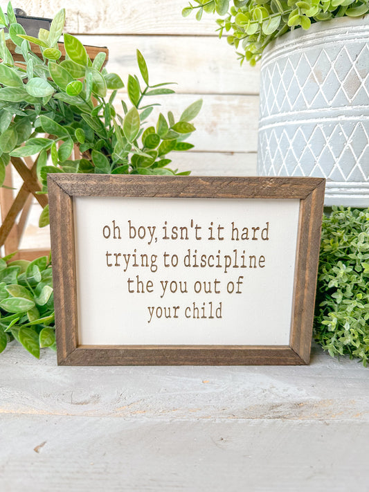 Oh boy, isn’t it hard trying to discipline the you out of your child. Laser engraved wood sign.