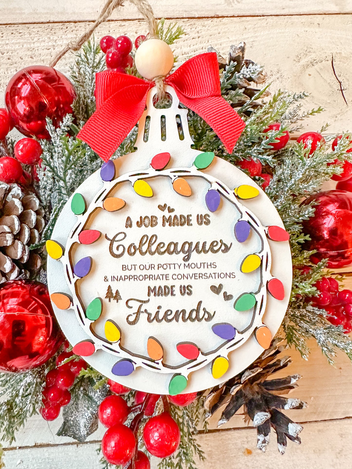 A job made us collogues but our potty mouths made us friends ornament