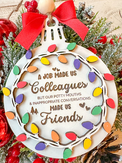 A job made us collogues but our potty mouths made us friends ornament