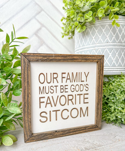 Our Family Must Be God’s Favorite Sitcom- Laser Engraved Wooden Sign