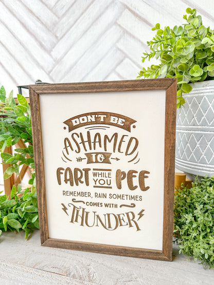 Don’t be ashamed to fart while you pee remember, rain sometimes comes with thunder. Laser Engraved Wooden Sign