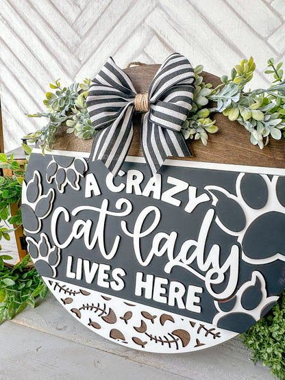 A crazy cat lady lives here 18’ door round