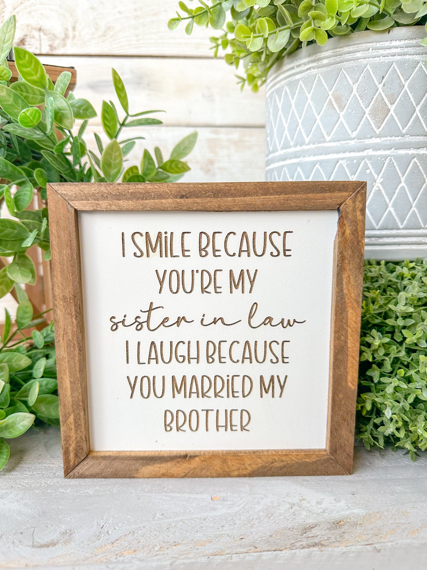 I smile because you’re my sister-in-law, I laugh because you married my brother