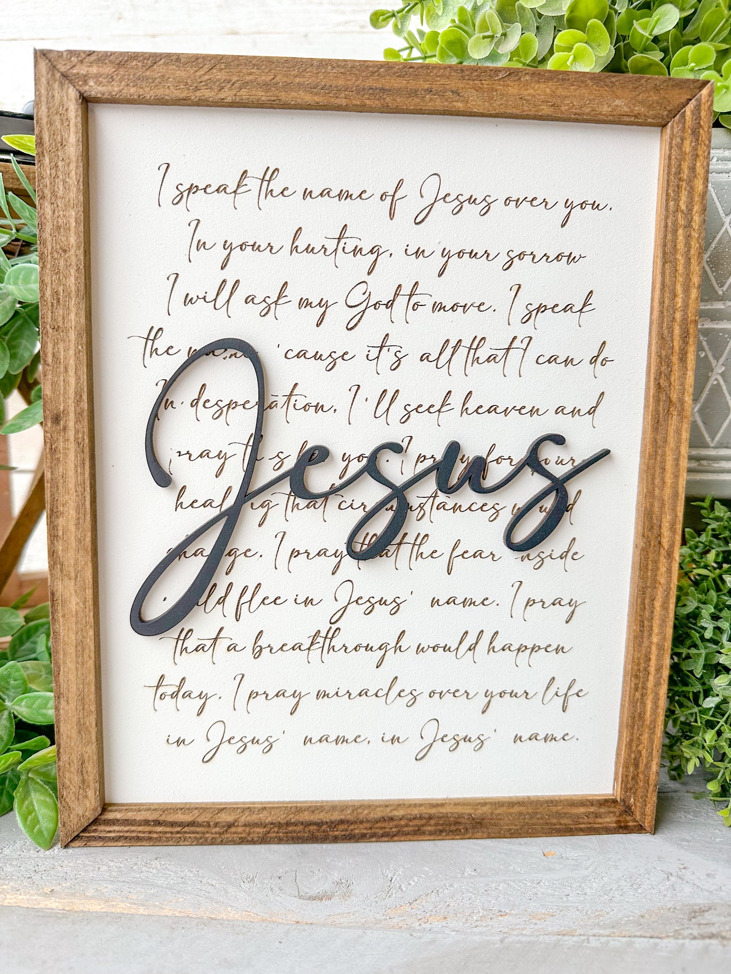I speak the name of Jesus over you. Laser engraved wood sign.