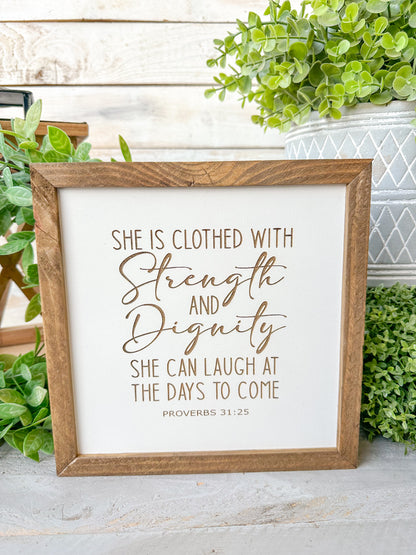 She is closed with strength and dignity. She can laugh at the days to come Proverbs 31:25. Laser engraved wood sign.