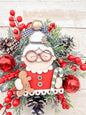Mrs. Claus with glass, candy canes and ginger