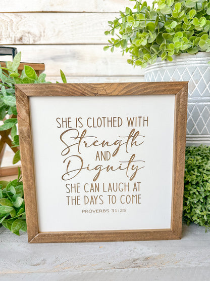 She is closed with strength and dignity. She can laugh at the days to come Proverbs 31:25. Laser engraved wood sign.