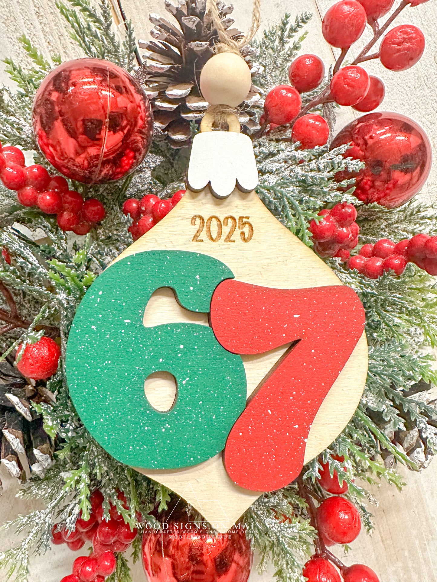 67 wooden ornament, Christmas – 2025 Keepsake