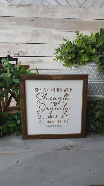 She is closed with strength and dignity. She can laugh at the days to come Proverbs 31:25. Laser engraved wood sign.